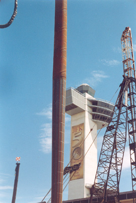 Tapertube being hoisted for driving, control tower in the background