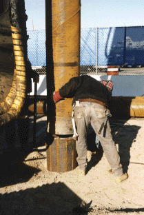 Pipe being spliced to driven section of Tapertube